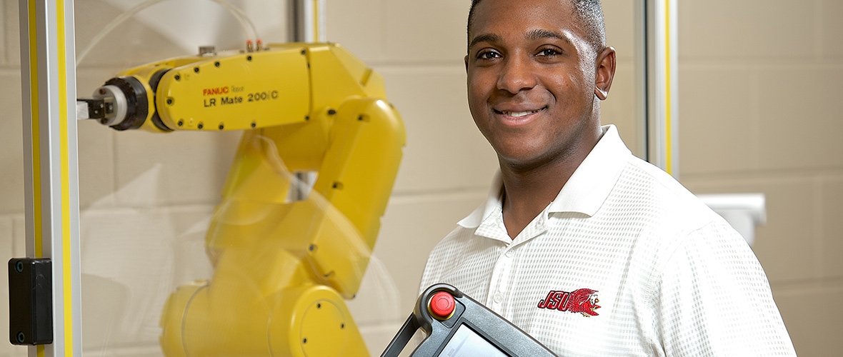 Engineering student with robot