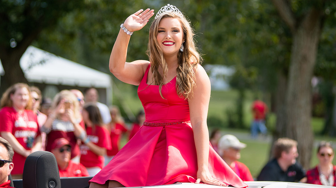 Homecoming queen Madison Burell rides in the homecoming parade