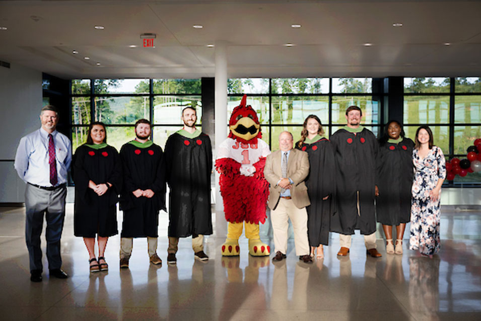 mat graduates and Cocky