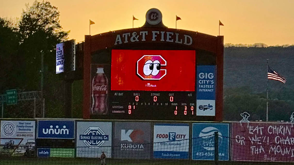 A sunset shot of the scoreboard