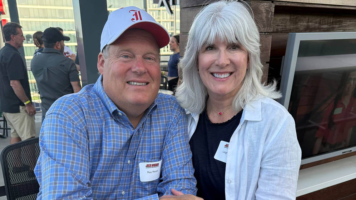 Two proud alumni