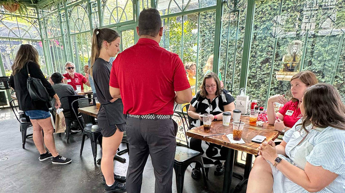 alumni catching up over lunch