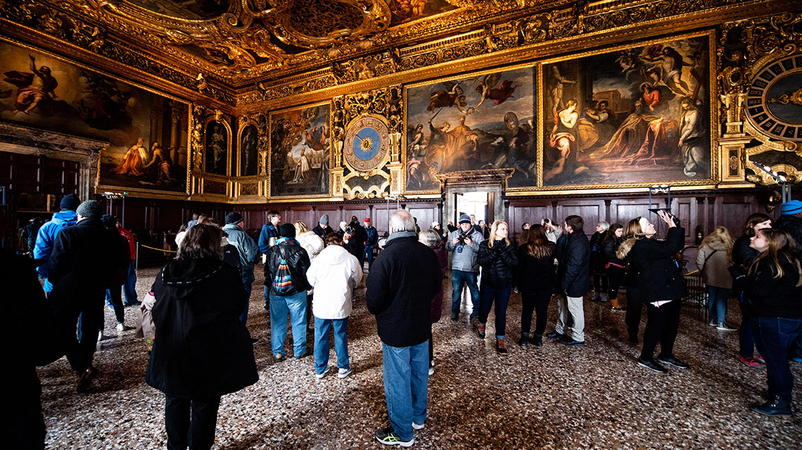 JSU Alumni view elaborately frescoed gilded walls and ceilings at the Doge's Palace in Venice.