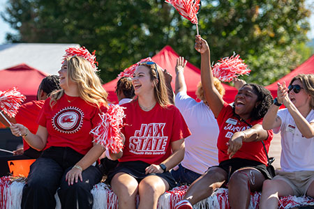 Jax State students ride in the homecoming parade