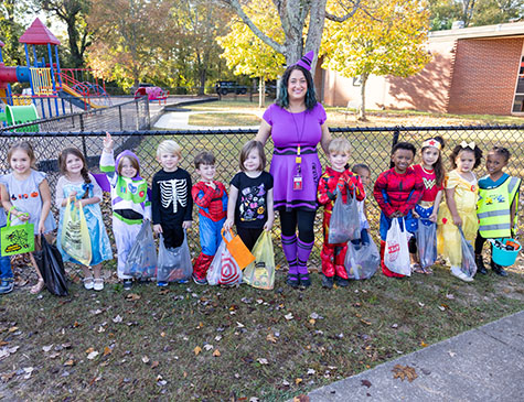 Children dressed in Halloween costumes after Trick-or-Treating