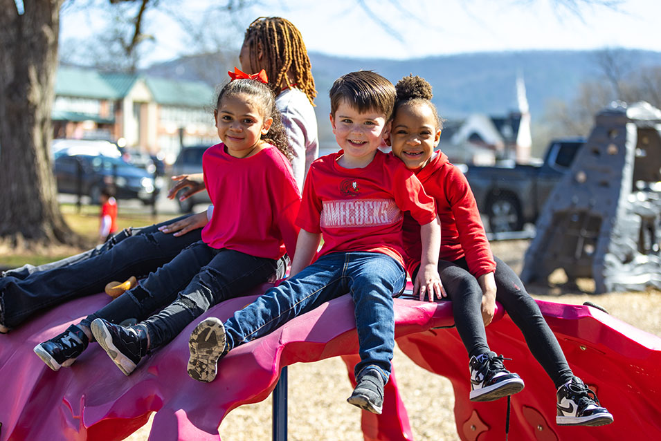 Children playing on a slide