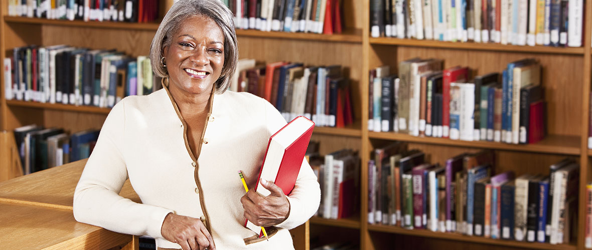 School librarian in library