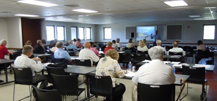 a group in a meeting room at the Canyon Center