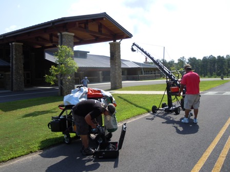a film crew at the entrance to the Canyon Center