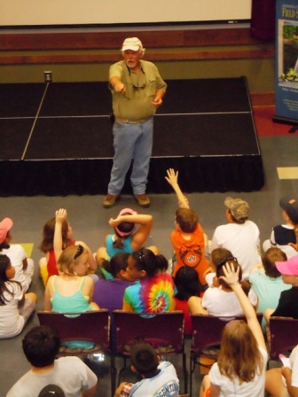 Children asking BJ Johnson questions at a Canyon Center event