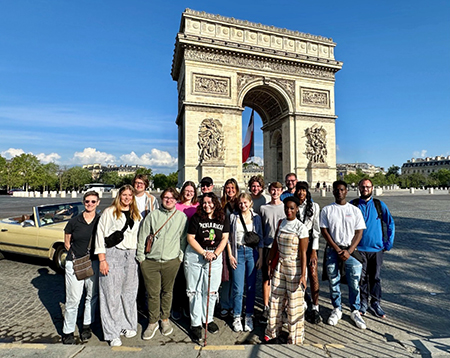 Our class gathered in front of the Arc de Triomphe.