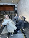 Adyson Merchant, Reanna Medders, and Hannah Bock on the escalator of the D.C. Metro 