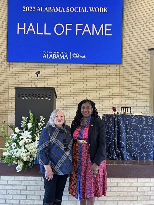 Rebecca Turner with the dean of social work at the University of Alabama. 