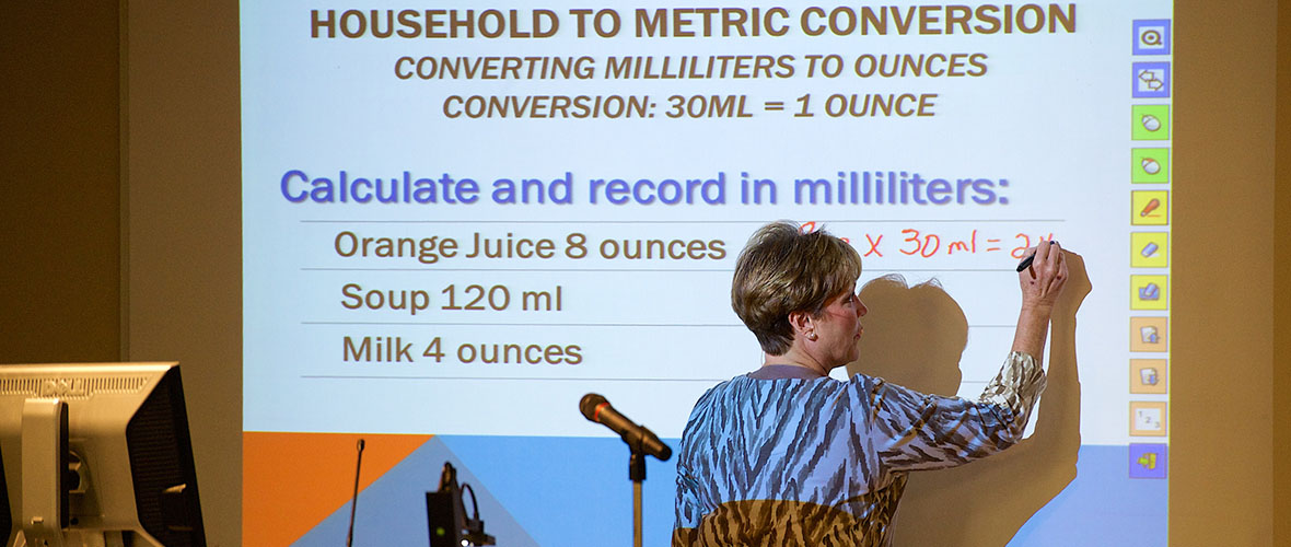 Nursing Instructor talking about Metric Conversions