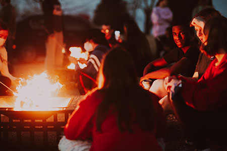 Students enjoying campfire