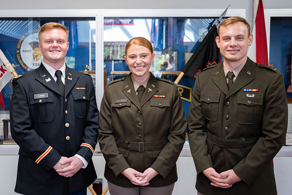 Three military students side by side