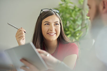 An adult student smiling