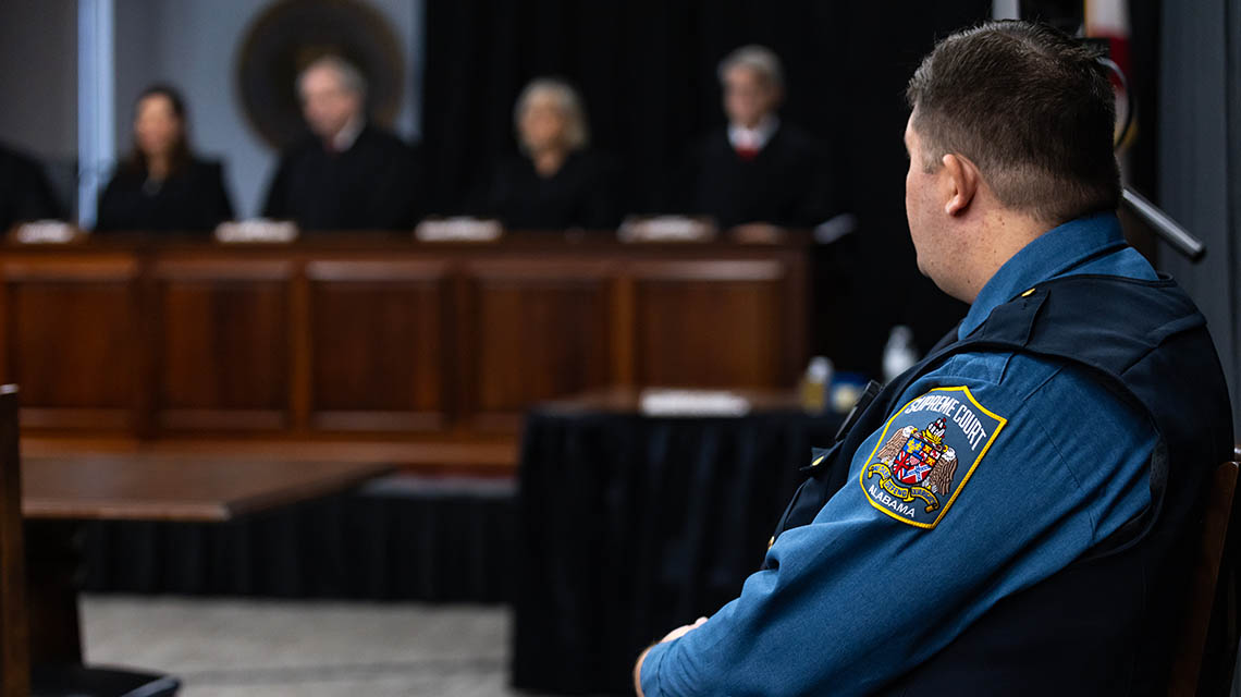 Member of ALEA overseeing the Court proceedings