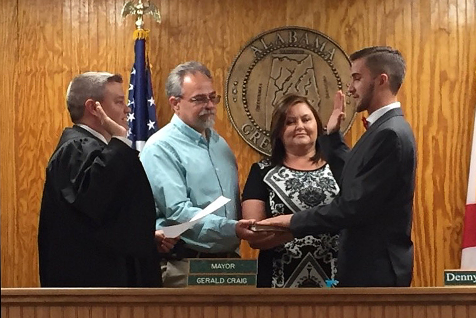Sharp being sworn in as a Sylvania councilman