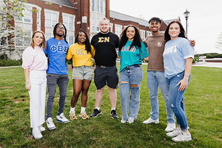 Students walking in front of Angle Hall
