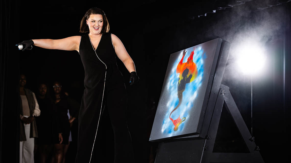 A contestant painting
