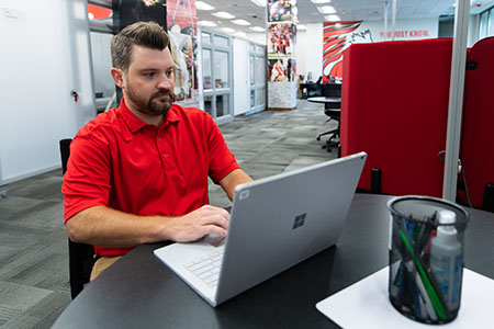 Adult student at table