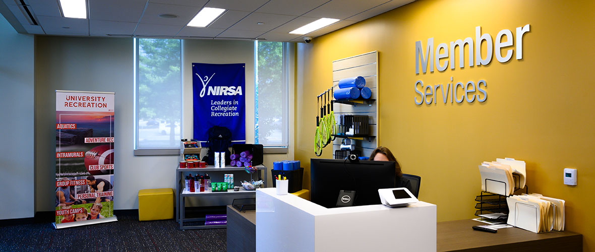 A view of the member services desk and pro shop.